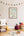 Framed children's animal alphabet poster with animal illustrations on a wall in a nursery.