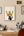 Home office setup with a desk, chair, and wall art featuring a large 'W' for International Women'sDay