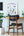 Home office setup with a desk, chair, and Office Ergonomics poste.