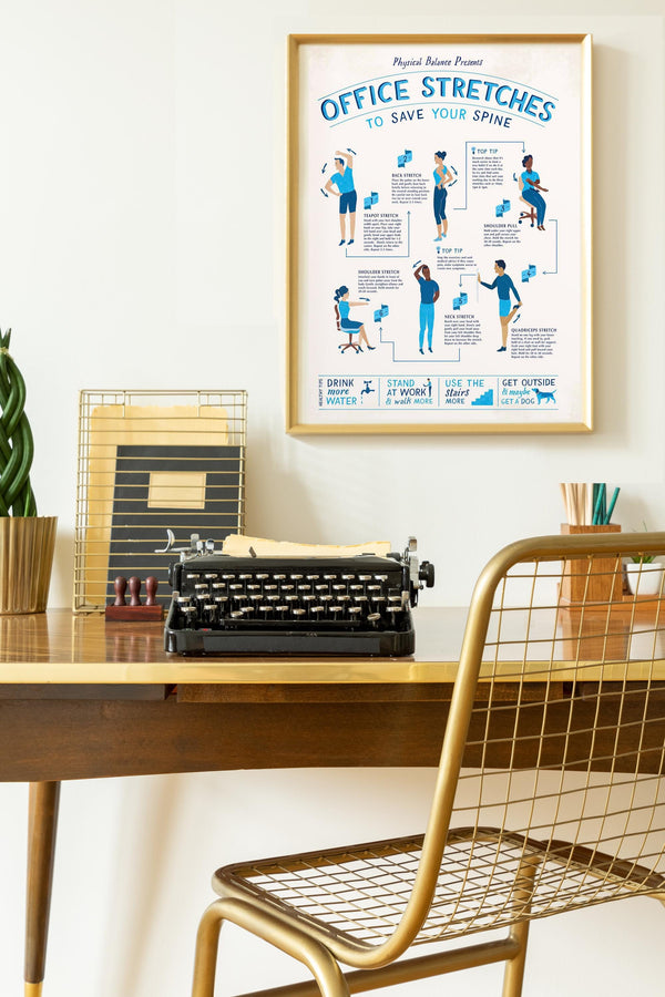 Framed Office Stretches poster on a wall above a desk with a typewriter and chair.