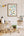 Children's room with a framed animal A-Z alphabet poster, toys, and a penguin plush toy.