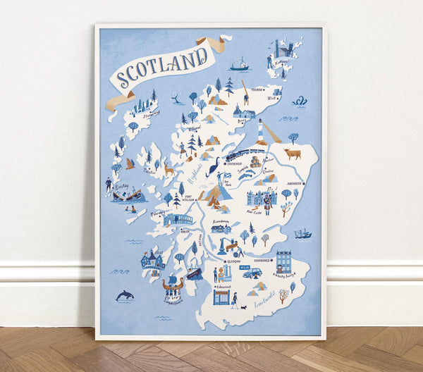 Illustrated map of Scotland on a light blue background, framed and leaning against a white wall.